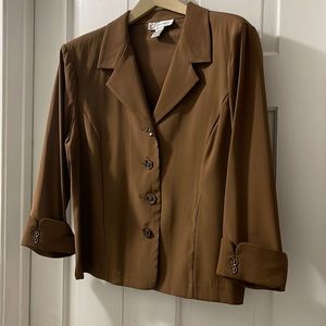 Well cared for Dress Barn blazer. Bob-smoking home.